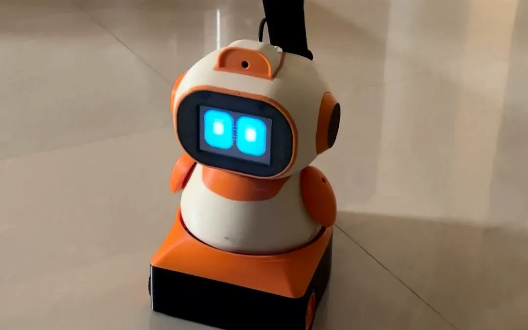 Hai Robo for Kids, the cream and orange desk companion with glowing eyes